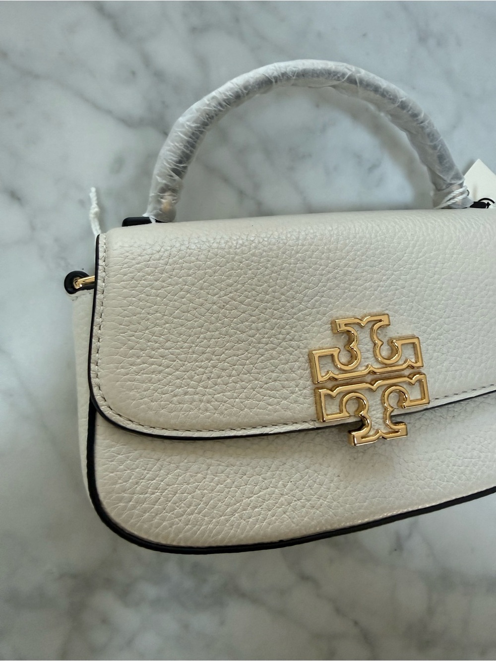 Tory Burch Britten Mini Pebbled Leather Top-Handle Crossbody Cream - Picture 4 of 9